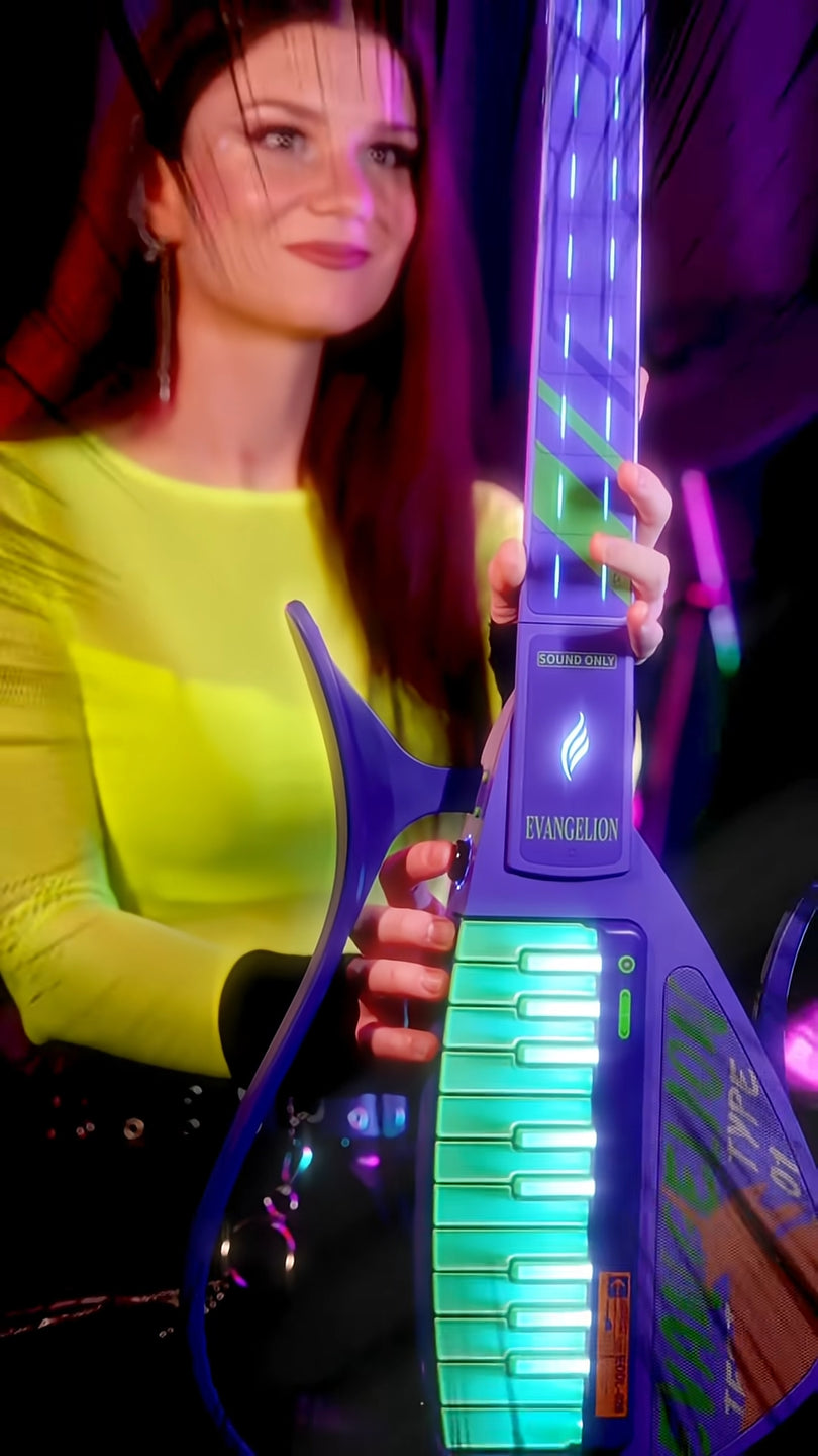 Person holding a Cyber-G EVA guitar with 'Evangelion' branding.