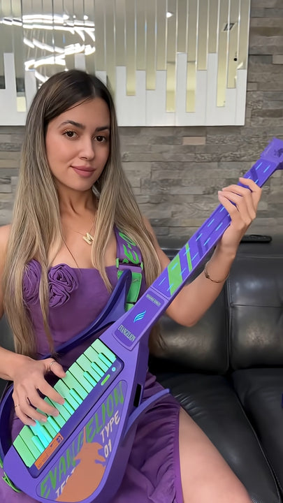 Woman holding a Cyber-G EVA guitar in a room with a modern decor.