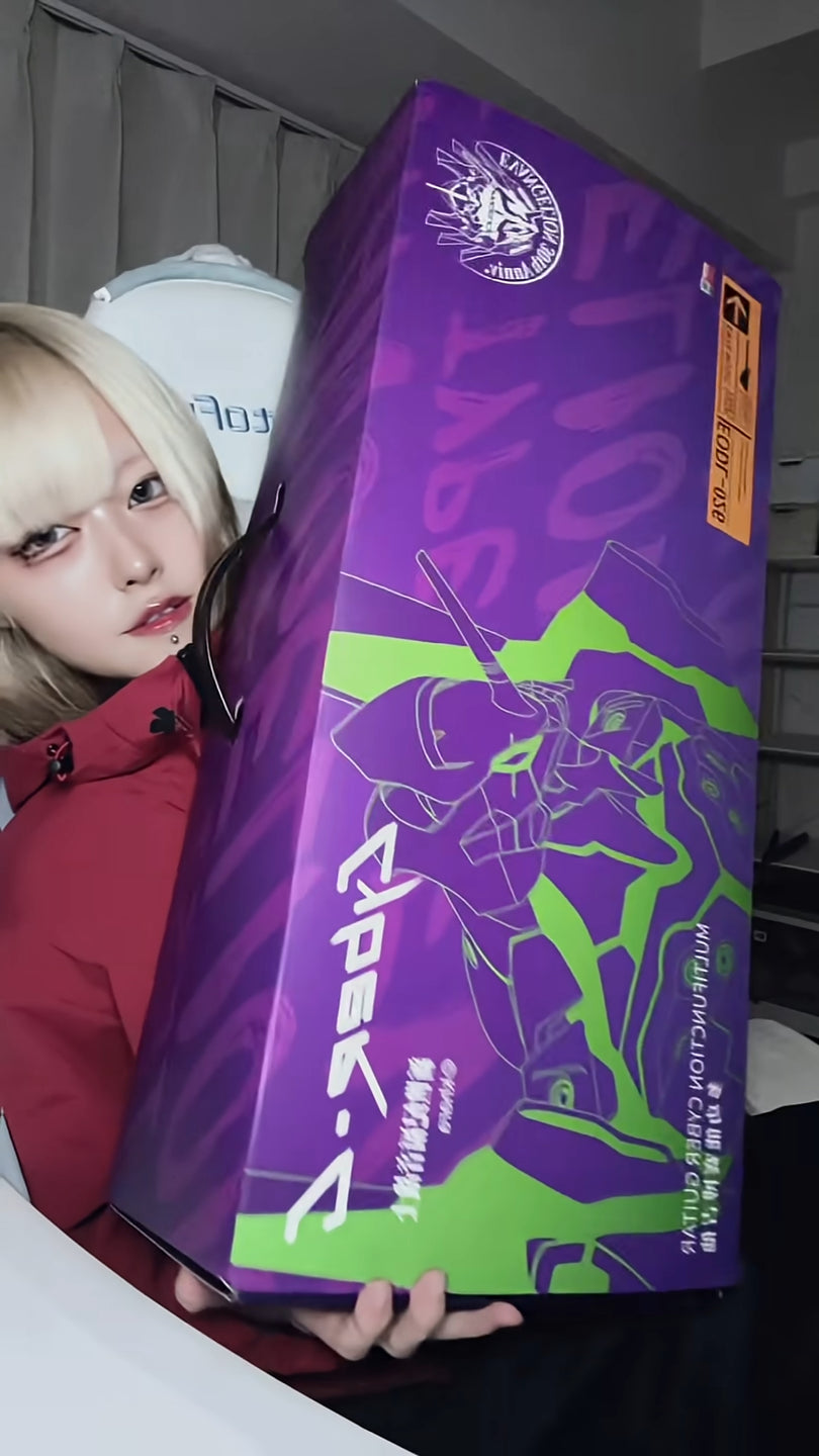 Person holding a purple and green box with Cyber-G branding