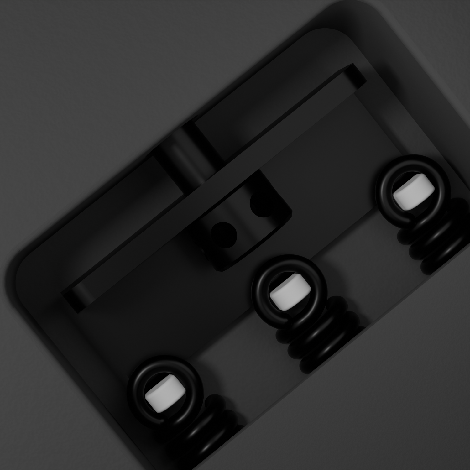 Back of the Enya Inspire body, showing the metal tremolo block with 3 springs.