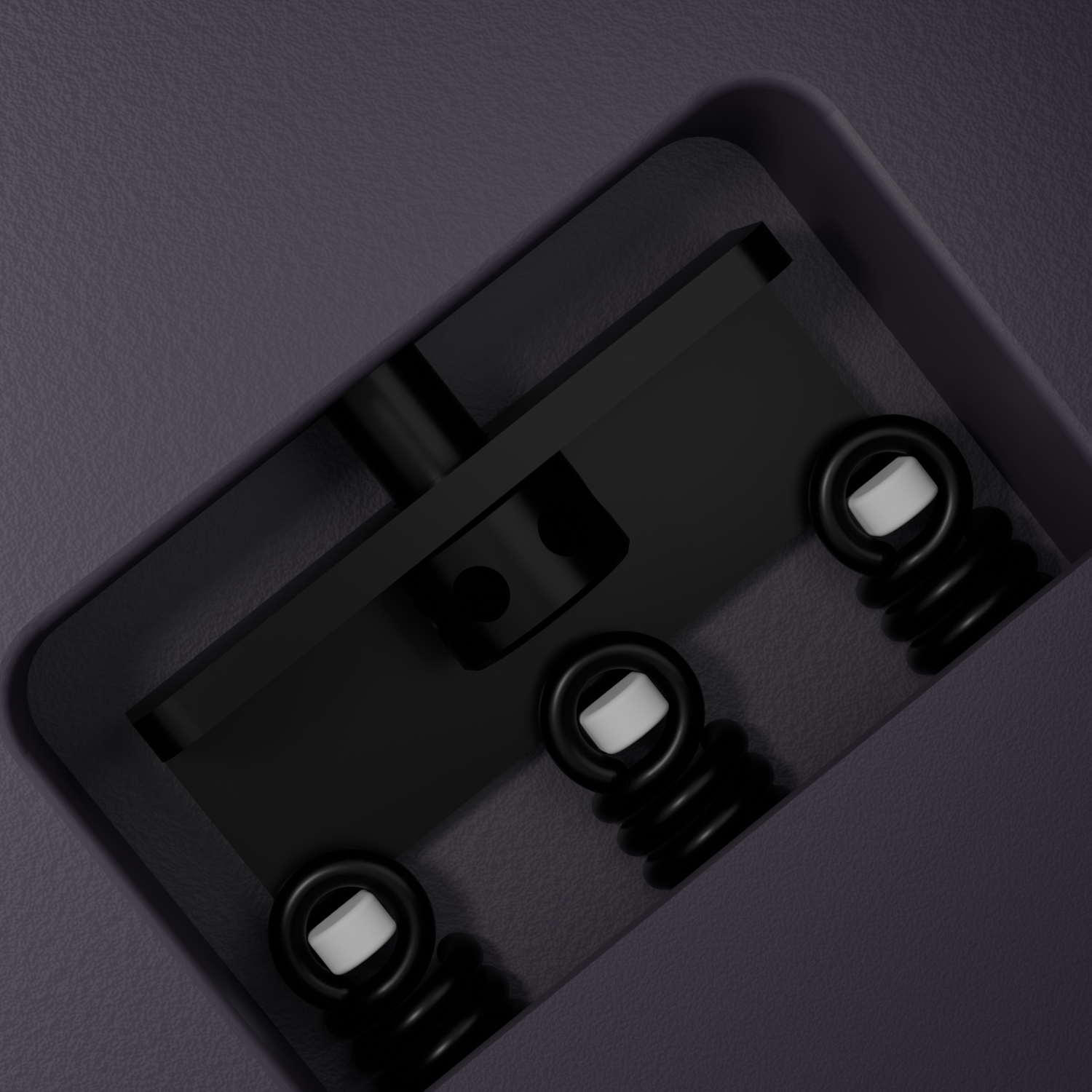 Back of the Enya Inspire body, showing the metal tremolo block with 3 springs.
