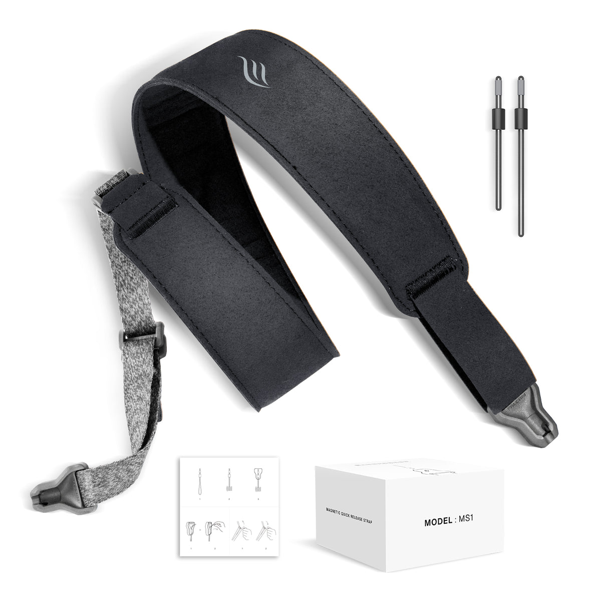 Black guitar strap with accessories on a white background