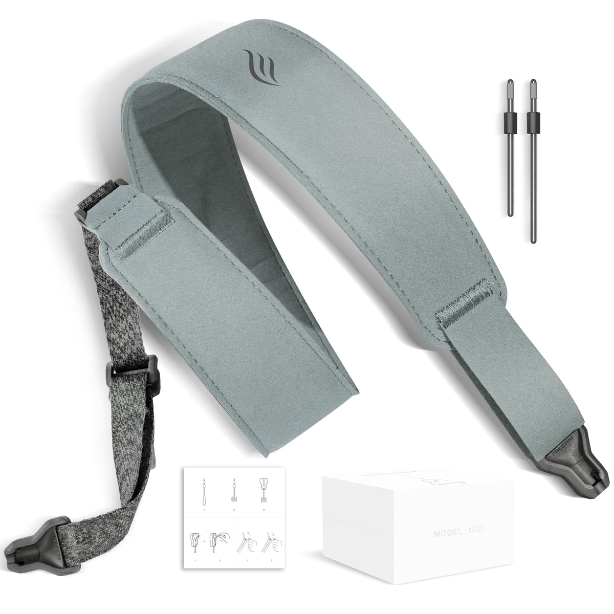 Gray blue guitar strap with accessories on a white background