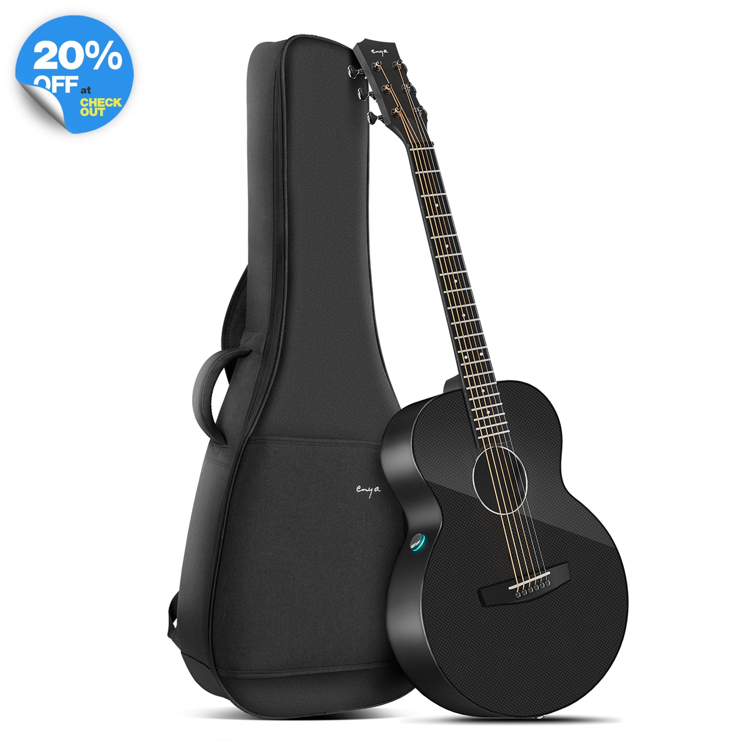A black electric-acoustic guitar, Enya X3 Pro Mini, with a guitar gig bag.