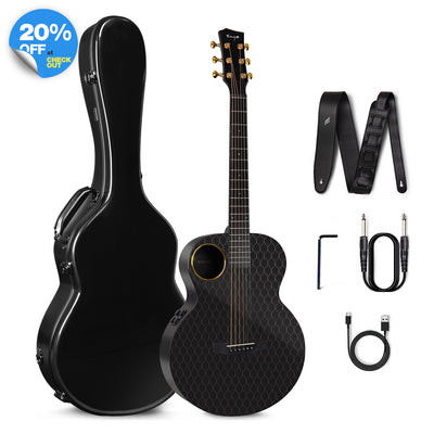 A black acoustic guitar, Enya X4 Pro Mini, displayed alongside a hardshell case, a strap, cables, and truss rod wrench.