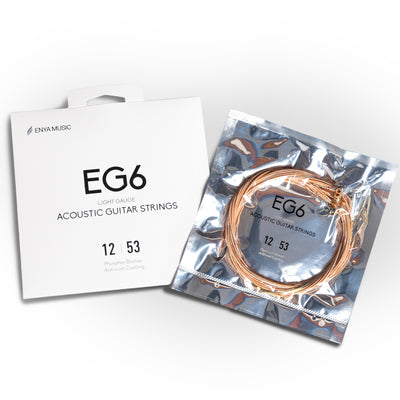 A pack of Enya Music acoustic guitar strings, model EG6, displayed alongside its packaging.
