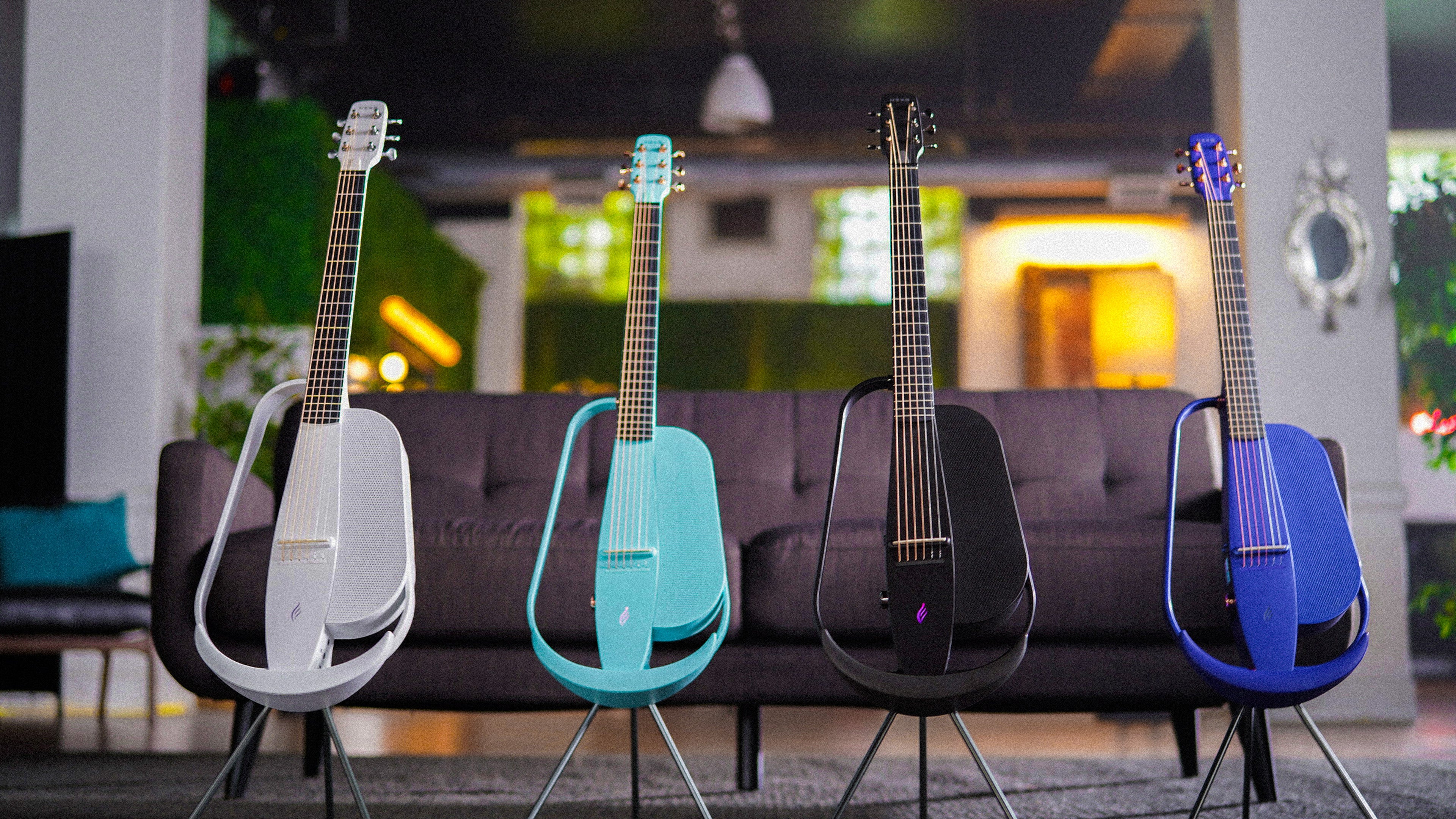 4 NEXG 2 guitars, left to right: White, Blue, Black, Purple