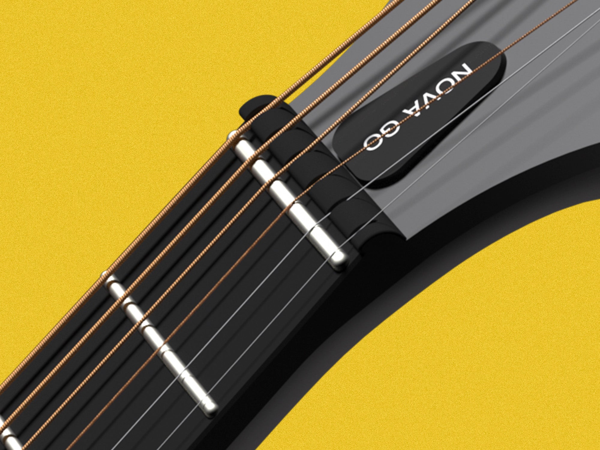 This pic shows the zero-fret design of the Nova Go, and the rounded end fret.